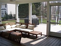 <b>View from inside a screened porch looking out over the deck</b>